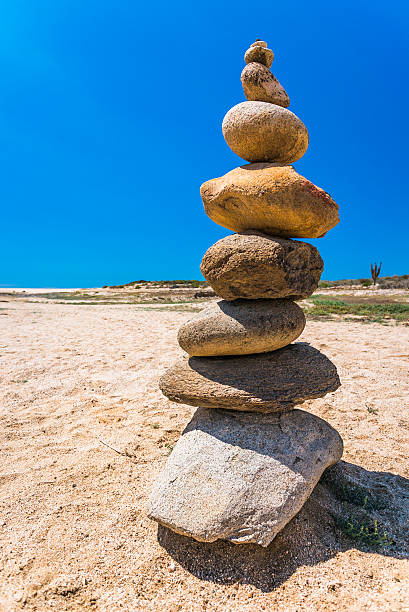 istock Sand stones in a zen balanced pile formation 469252800