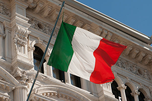 Italian flag blowing in Piazza dell'Unità, Trieste