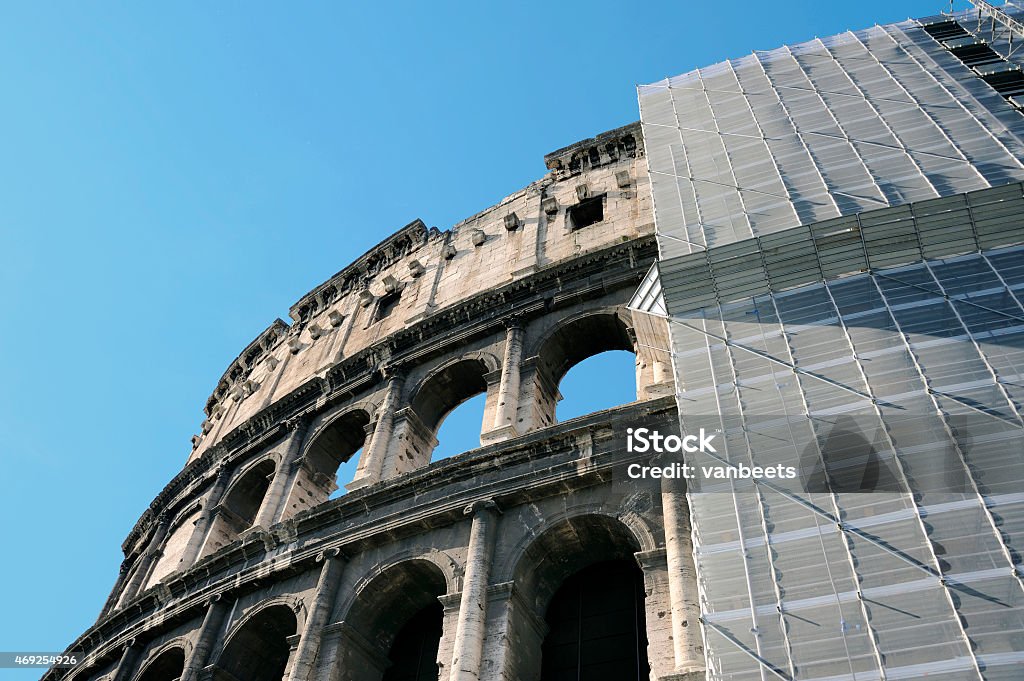 The Colosseum in Rome The Colosseum in Rome with restore works in progress on the facade. 2015 Stock Photo