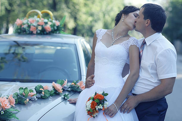 istock bride and groom at a wedding in summer nature 469257232