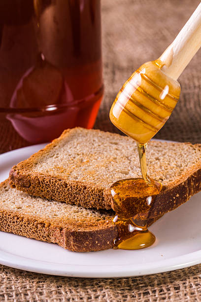istock fresh toast with honey poured 469257474