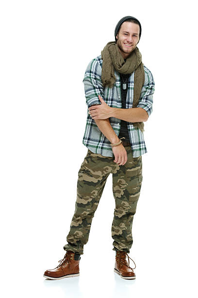 istock Smiling hipster standing and looking at camera 469258118