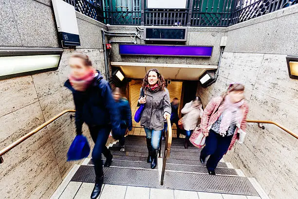 Photo of Young woman at tube exit in London