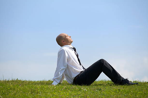 istock Businessman contemplating in park 469259598