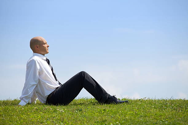 istock Businessman contemplating in park 469259600