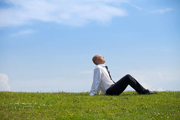 istock Businessman contemplating in park 469259616