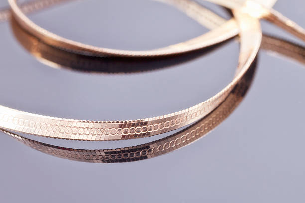istock gold chain with an unusual weaving 469260278