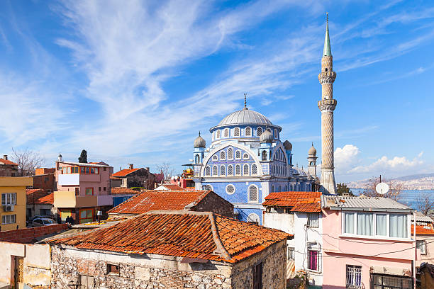 street view with fatih camii mosque, izmir, turkey - izmir stok fotoğraflar ve resimler