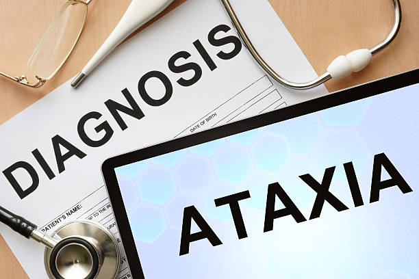 istock Tablet with diagnosis ataxia  and stethoscope. 469270378