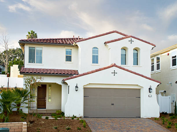 istock Exterior of a house representing home 469275138