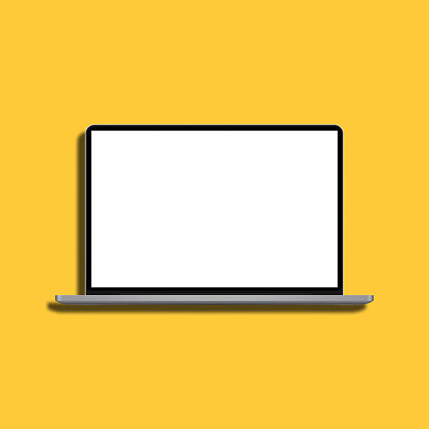 Laptop on yellow background
