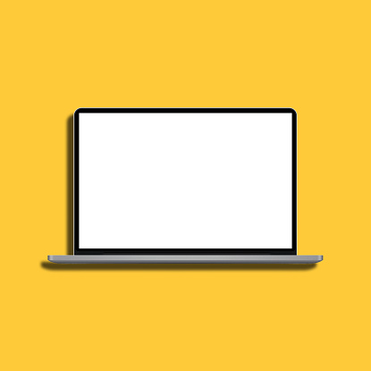 Blank screen laptop on yellow background.