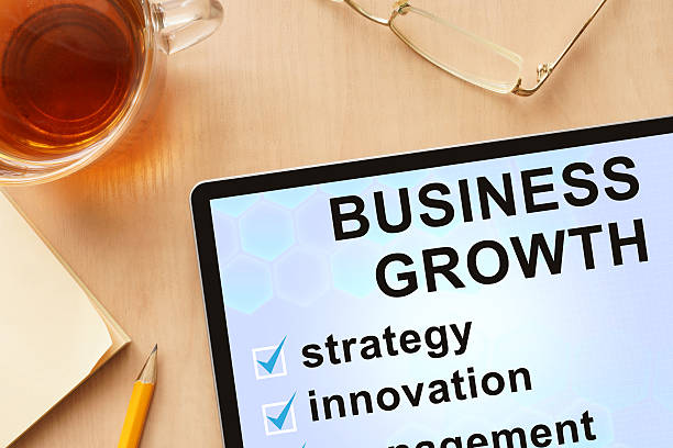 istock Tablet with words business growth. 469279710