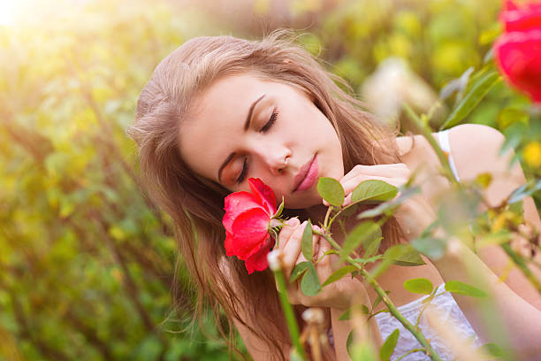 istock Beautiful woman with rose. 469280398
