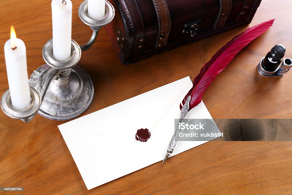 Letter Letter written with a quill left on the wooden table 2015 Stock Photo