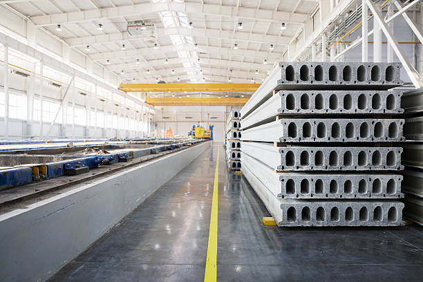 istock Stack of reinforced concrete slabs in a house-building factory workshop 469282780
