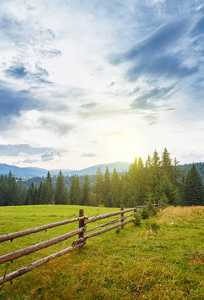 istock wooden fence mountain landscape 469283868