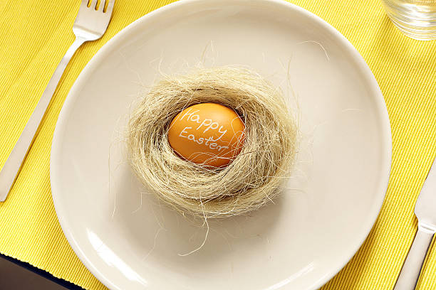 istock Easter egg with inscription happy easter in a nest 469290562
