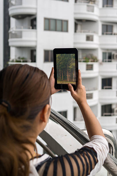 istock Woman holding tablet in her hands 469291700