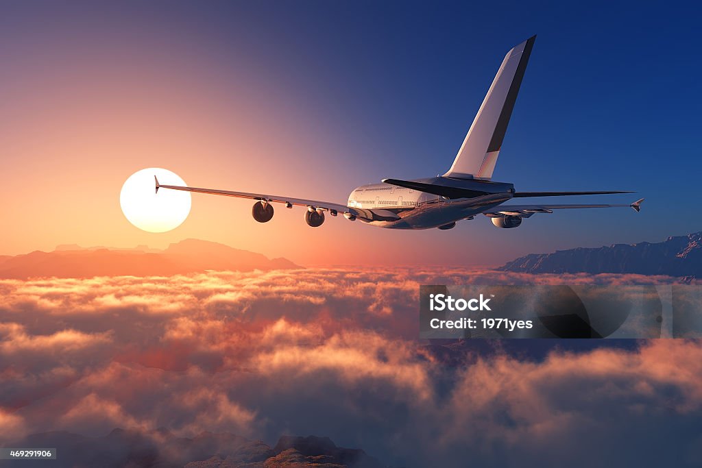 Passenger plane Passenger plane above the clouds. 2015 Stock Photo