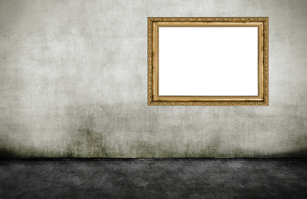istock Golden wooden empty frame on a dirty wall 469294598