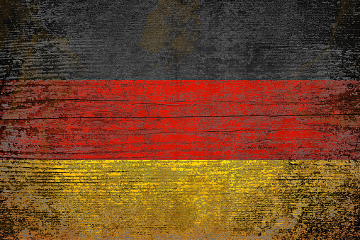 Grunge flag of Germany  (painted on a wooden panel)