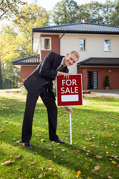 istock Estate agent trying to sell house 469295146