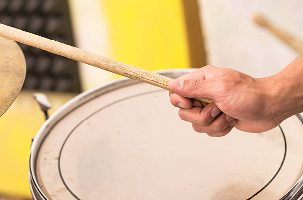 istock closeup shot of musician playing drums 469302014