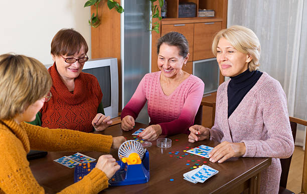 istock female friends sitting with lotto 469305214