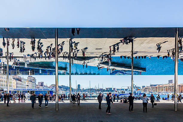 Marseille, France - April 5, 2015: people visit Norman Fosters pavilion with mirrored ceiling. The pavillon was inaugurated in 2013.