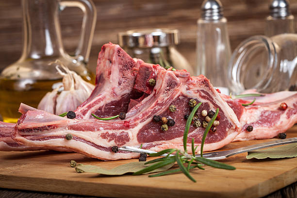 istock Raw lamb chop ready for frying. 469315262