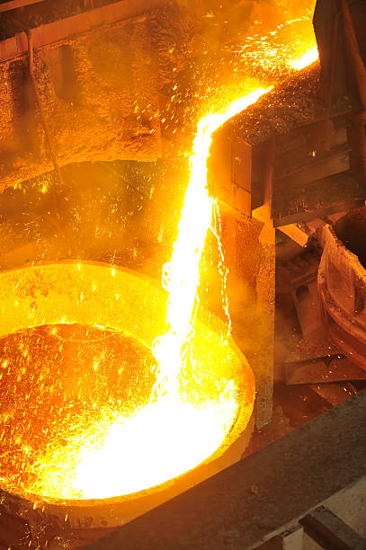 istock Pouring of liquid metal 469316218