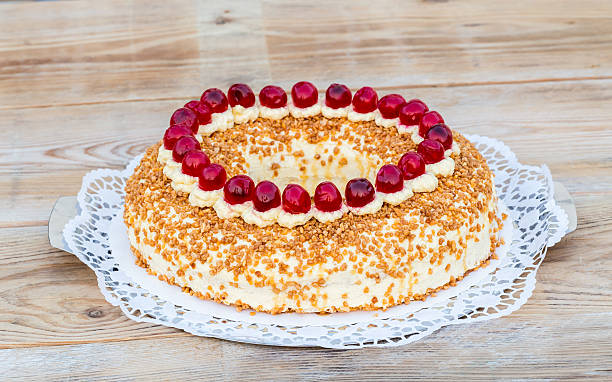 istock Frankfurt crown cake with cherries on rustic wood 469316906
