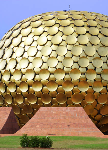 Auroville, India - April 1, 2015: Matrimandir - Golden Temple in Auroville. Matrimandir is an edifice of spiritual significance for practitioners of Integral yoga, situated at the centre of Auroville initiated by The Mother of the Sri Aurobindo Ashram