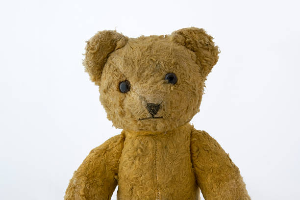 istock Torso of an old brown teddybear 469320470