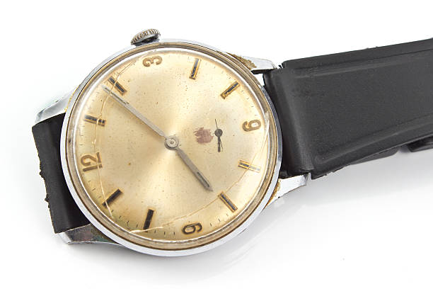 istock Closeup of old broken wristwatch isolated on white 469321342