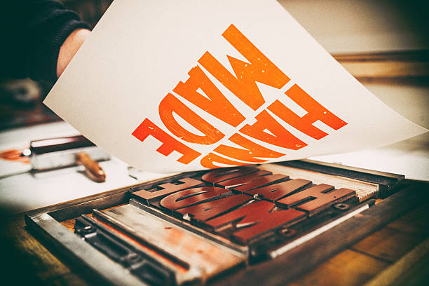 Artisan composing movable type for Letterpress Printing.