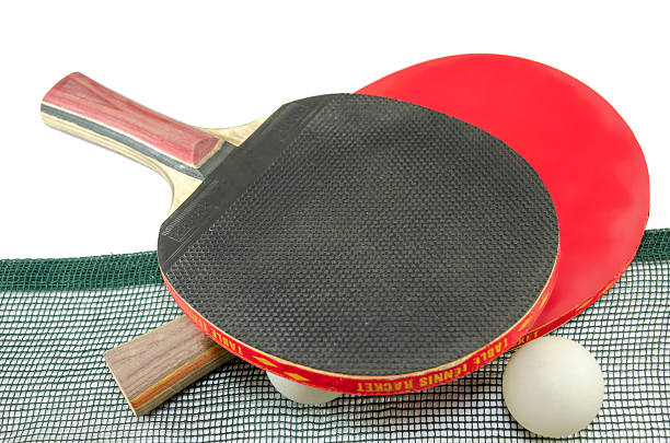 istock Two table tennis rackets and a net isolated 469326820