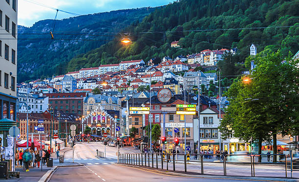Bergen City Center An opening to the bustling and active city of Bergen, Norway. Home to Houses on the hill, a tram service as well as the Iconic Bergen Wharf. bergen norway stock pictures, royalty-free photos & images