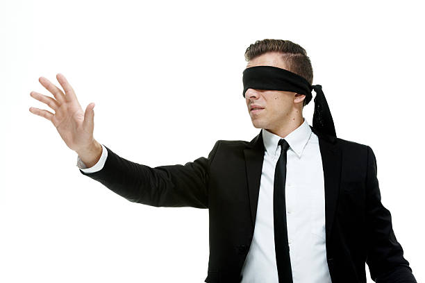 istock Blindfold businessman searching 469328118