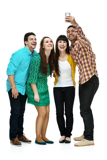 istock Four friends taking a selfie 469328324