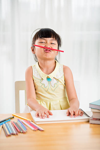 istock Playful Vietnamese girl 469328354