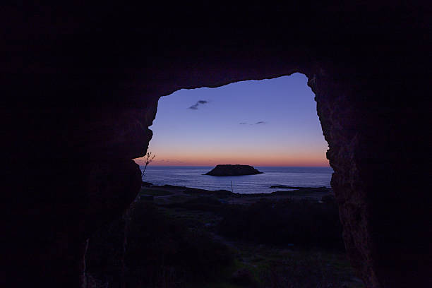istock Heavenly view from a cave at dusk 469328564