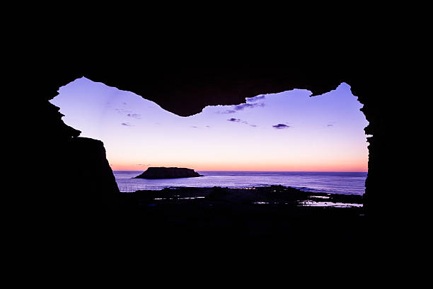 Heavenly view from a cave at dusk