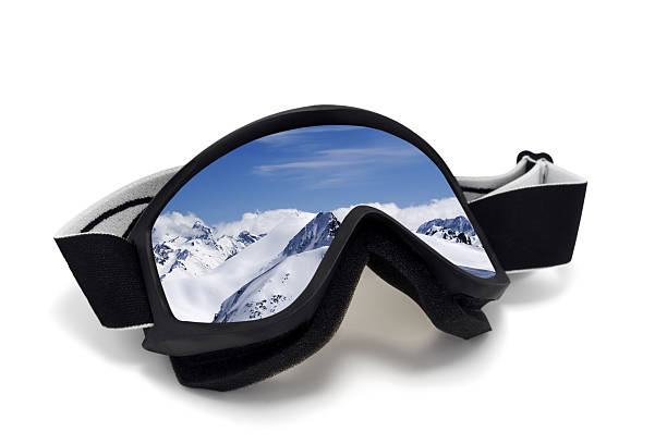 istock Ski goggles with reflection of mountains at sun day 469329010