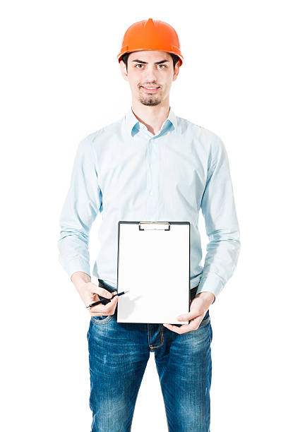 istock Young Construction Worker Showing his Plans on Blank Clipboard 469329126