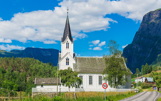 A Church by the Highway in the Songdal County. Tucked away quietly in between lush as well as rocky mountains.