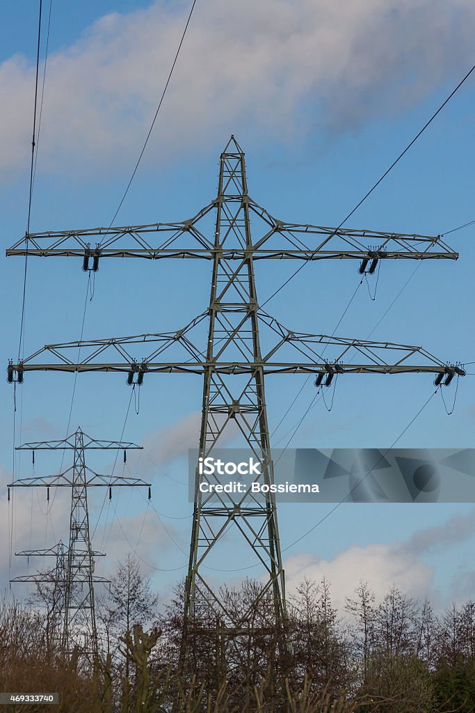 Electric overland power mast Electric overland power lines and  mast for energy transport. 2015 Stock Photo