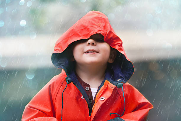 If you think the weather's cool, check me out Shot of an adorable little boy playing outside in the rainhttp://195.154.178.81/DATA/i_collage/pi/shoots/783464.jpg only boys stock pictures, royalty-free photos & images