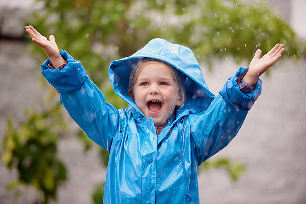istock Happiness is dancing in the rain 469338902